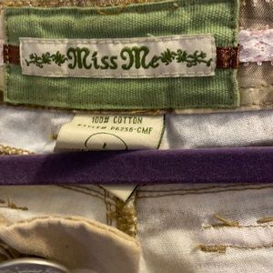 Miss Me Cargo pants with draw string bottoms.